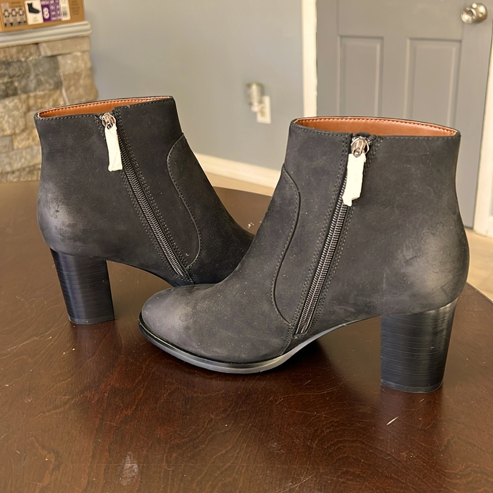 Black distressed booty size 8 1/2 never worn.